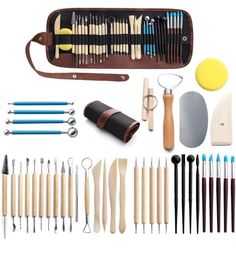 an assortment of kitchen utensils and tools in a case on a white background