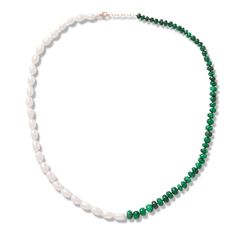 Deep green malachite and lustrous white pearls strung together as a necklace. We call this our union necklace as it marries two stones from completely different environments creating a beautiful match. Malachite Freshwater Pearl 14 Karat Gold 18 to 19 inches Handmade in NYC About the stone Malachite represents good fortune, protection, transformation, and creativity. This stone serves as a guardian against electromagnetic digital pollution helping us create space and clarity to bring us back to the divine healer of earth, Mother Nature. The beginnings pearls occur when an oyster, mussel, or clam attempts to soothe the part of its body when a granule enters its shell. It does this by creating a unique coating layer over the irritated area, known as a nacre. The sea animal will add layer aft Elegant Single Strand Malachite Jewelry, Earth Mother, Green Malachite, Feminine Energy, Green Stone, Divine Feminine, Deep Green, Handbag Accessories, Pearl White