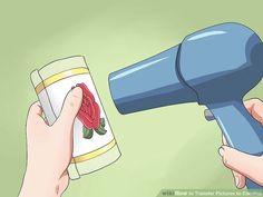 a hand holding a blue blow dryer with a red rose on it