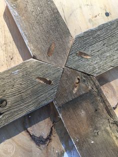 four pieces of wood with holes in them