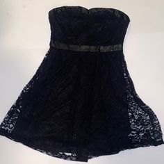 Brand: Niki Biki Size Large Black Lace Dress Strapless Zipper Closure On Back Faux Leather Accent On Bodice And Midriff Gothic Cosplay Emo Nwot Black Lace Strapless Corset Dress, Black Lace Mini Dress For Costume Party, Black Strapless Mini Dress For Costume Party, Strapless Black Mini Dress For Costume Party, Strapless Lace Dress For Costume Party, Black Lace Strapless Dress For Night Out, Goth Hoco Dress, Baddie Wishlist, 2010 Dresses