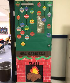 a classroom door decorated with christmas decorations