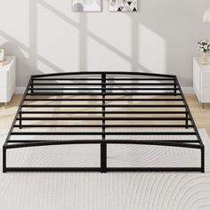 the bed frame is made up and ready for someone to use it in their home