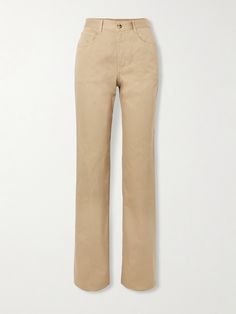 The neutral sand color of SAINT LAURENT's 'Clyde' jeans make them look like tailored pants at first glance. Made from denim, they're designed to sit high on the waist and have a classic five-pocket construction and straight-leg shape. Ysl Clothes, Tailored Jeans, Jean Trench Coat, Saint Laurent Jeans, Random Clothes, Executive Assistant, Designer Pants, Ankle Length Jeans, Sport Swimwear