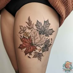 a woman's thigh with leaves on it