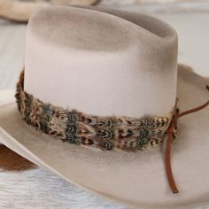 1 Unit One size fits most. Adjustable with leather ties. *Hat not included.* Cowgirl Hat Bands, Feather Hat Band, Hat Bands, Feather Hat, Cowgirl Hat, Pets For Sale, Cowboy Boots Women, Cowgirl Hats, Cowboy And Cowgirl