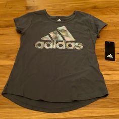 Girls Small 7-8 Adidas Top Nwt Short Sleeve. Large Logo On Front. Will Bundle 2+ Items For 10% Off- Adidas Casual Tops For Playwear, Casual Adidas Tops For Playwear, Addidas Shirts, Adidas Tshirt, Adidas Short, Usa Girls, Adidas Top, Adidas Tee, Adidas Girl