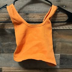 Nwot Never Been Worn - Xs/S Free People Movement X The Class Criss-Cross Orange Bra. Note: This Runs Small But It Is Extremely Stretchy Casual Orange Seamless Tops, Orange Fitted Crop Top, Fitted Seamless Orange Crop Top, Trendy Orange Seamless Top, Orange Ribbed Sleeveless Top, Orange Stretch Tank Top For Summer, Orange Stretch Summer Tank Top, Spring Racerback Crop Top For Loungewear, Spring Loungewear Racerback Crop Top