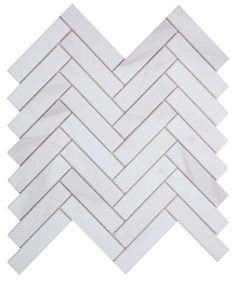 a white marble herringle tile pattern