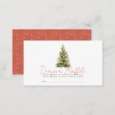 a red and white holiday card with a christmas tree on the front, in gold foil