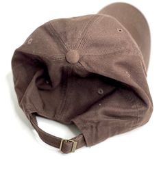 This hat is adjustable and it a low profile fit. Vintage Adjustable Dad Hat With Short Brim, Classic Brown Baseball Cap With Curved Brim, Adjustable Fit Brown Hat With Short Brim, Brown Adjustable Fit Hat With Short Brim, Classic Brown Baseball Cap With Flat Brim, Classic Brown Flat Brim Baseball Cap, Classic Adjustable Dad Hat With Curved Brim, Classic Adjustable Visor Fitted Hat, Adjustable Brown Flat Brim Dad Hat