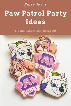 four decorated cookies with cartoon characters on them