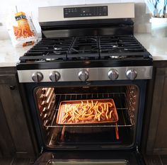 an oven that has some food in it