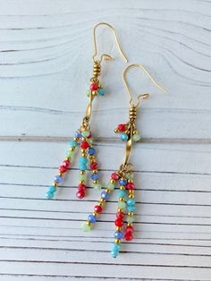 Lenora Dame Firecracker Earrings - Etsy Gold Beaded Earrings With Colorful Beads, Gold Beaded Dangle Earrings For Festive Occasions, Nickel-free Czech Glass Beaded Earrings For Parties, Nickel Free Czech Glass Beaded Earrings For Party, Gold Czech Glass Beaded Earrings For Party, Gold Beaded Earrings With Colorful Beads As Gift, Gold Brass Earrings With Colorful Beads, Gold Beaded Earrings With Ear Wire For Party, Gold Beaded Earrings With Dangling Beads For Festive Occasions