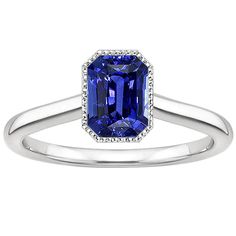 Sparkling Sapphire Radiant Cut Gold Ring METAL SPECIFICATIONS White Gold 14K STONE SPECIFICATIONS Stone Name : Blue Sapphire Stone Cut : Radiant Stone Details : There is one radiant cut sapphire approx. 3 carats (Approx. Size 9 x 5 mm) and approx. 0.25 carats of diamonds on the sides. Natural earth mined stones. Color : F Quality : VS1 Quality of Sapphire : AAA Total : Approx. 3.25 Carats RING SPECIFICATIONS Size : 6.5 (Can ship in any size, please send us a message about size after placing the 3 Carat Ring, Radiant Cut Rings, Blue Sapphire Stone, Blue Sapphire Rings, Radiant Cut, Sapphire Stone, Natural Earth, 3 Carat, Stone Cuts