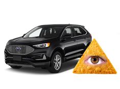 a black car with a triangle shaped piece of food next to it's eye