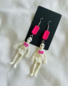 Upcycled Skeleton PEZ Earrings  ♻️Recycling toys into jewelry♻️ 🌟Measurements: 5" long including hook Pink Skull Jewelry For Halloween, Jewelry Measurements, Halloween Skeleton, Halloween Skeletons, Spiders, Kitsch, Skeleton, Jewelry Earrings Dangle, Etsy Earrings