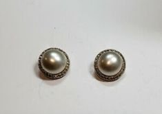 Formal Pearl Clip-on Earrings, Classic Pearl Clip-on Earrings For Party, Vintage Pearl Clip-on Earrings For Formal Occasions, Elegant Formal Clip-on Earrings With Rhinestones, Formal Round Pearl Drop Clip-on Earrings, Elegant Formal Pearl Earrings With Rhinestones, Round Clip-on Rhinestone Earrings For Parties, Round Rhinestone Clip-on Earrings For Parties, Round Clip-on Earrings With Rhinestones For Party