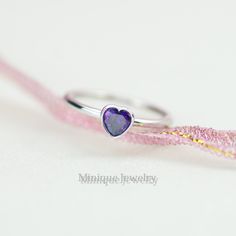 "Heart Shaped Amethyst Minimalist Sterling Silver Ring, Purple, Amethyst Color Gemstone, Heart Shaped. Dainty, Stack.  Valentine's Day Gift for Mom, Girlfriend, Sister, Friend, or You!  Solid Sterling Silver. FEBRUARY BIRTHSTONE. A perfect gift for you and your loved one. Tell her, \"you are my heart!\" It's dainty but sturdy and can be worn every day. A unique piece you'll truly treasure! Material: 925 Sterling Silver Gemstone: Amethyst CZ High-polished finish.  The price is for ONE ring. This dainty, elegant, but sturdy ring comes in a gift box and SHIPS the NEXT DAY! 💚 The same design is available in gold and silver with different birthstones. Here are the page links: Silver_Green_Heart (#406) https://www.etsy.com/listing/1348658407/emerald-heart-silver-ring-may-birthstone Gold_Green_H Valentine's Day Amethyst Ring, Purple Sterling Silver Rings For Valentine's Day, Sterling Silver Amethyst Ring For Valentine's Day, Sterling Silver Amethyst Ring For Valentine's Day Promise, Sterling Silver Amethyst Promise Ring For Valentine's Day, Heart Shaped Amethyst, February Birthstone Ring, Garnet Heart, Gold Heart Ring