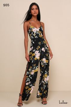 Your style will be the talk of the town when you wear the Lulus Beautiful Blooms Black Floral Print Wide Leg Jumpsuit! Silky woven black fabric, decorated in gorgeous floral print, shapes a princess-cut bodice with adjustable crisscross straps and V-neckline. Open back and fitted waist top wide-leg pants with thigh-high slits. Hidden back zipper/clasp. Fit: This garment fits true to size. Length: Floor length. Size medium measures 54" from adjustable straps to hem. Inseam: 30.50 Front Rise: 14.00 Bust: Great for any cup size. Waist: Fitted - very fitted at natural waist. Hip: Not Fitted - room for hips. Undergarments: May be worn with an adhesive bra, petals, or no bra. Fabric: Fabric has no stretch. Lined to mid-thigh. Shell: 100% Polyester. Lining: 100% Rayon. Hand Wash Cold. Do Not Blea Elegant Fitted Floral Jumpsuits And Rompers, Floral Print Jumpsuits And Rompers For Date Night, Elegant Floral Print Jumpsuits And Rompers, Elegant Floral Print Jumpsuits And Rompers For Night Out, Elegant Floral Jumpsuits And Rompers For Spring, Elegant Printed Fitted Jumpsuits And Rompers, Elegant Fitted Printed Jumpsuit, Fitted Floral Print Maxi Jumpsuits And Rompers, Black Fitted Jumpsuit With Maxi Length