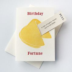 two birthday cards on top of each other with the words fortune written in red and yellow