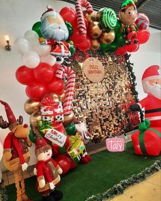 christmas decorations and balloons on display in an office