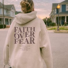 Faith Over Fear Christian Hoodie Bible Verse, Aesthetic Christian Sweatshirts, Jesus Hoodie, Church hoodie, Trendy Hoodie, Religious Hoodie ⭐HOW TO ORDER Please Choose the SIZE and COLOR From Drop Down Menu. ⭐MATERIAL  Gildan Sweatshirts and Hoodies are unisex heavy blend material made for comfort. These garments are made from polyester and cotton. All of my products are made to order, which means the product you receive will be extremely similar to what you you see in the photos however it is impossible to make to shirts identically the same. ⭐SIZES For most products sizes small to 3XL are available but please check the size chart before you purchase.  ⭐SHIPPING My products are made to order so please allow adequate time and shipping time can vary so please allow adequate time for shippin Bible Verse Sweatshirts, Christian Hoodie Design, Bible Verse Aesthetic, Verse Aesthetic, Christian Sweatshirts, Jesus Clothes, Aesthetic Christian, Christian Shirts Designs, Christian Hoodies