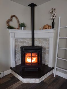 Corner mantle, corner fireplace, corner hearth, corner wood pellet stove, airstone, DIY, dyed concrete countertop hearth pad, farmhouse Corner Pellet Stove, Pellet Stove Hearth, Wood Stove Decor, Stove Hearth, Hearth Pad