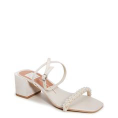 Elevate your dressy look to the next level with these women's Dolce Vita Zalima vanilla (white) heeled evening sandals. Fashioned with textile upper, these dressy sandals flaunt a trendy square open toe, appealing decorative faux pearl beads at the toe strap, and an adjustable ankle strap with buckle closure for that perfect fit. The synthetic outsole with covered block heel completes the look. | Dolce Vita Women's Zalima Evening Sandal in Vanilla Size 6 Medium Dressy Sandals, Evening Sandals, White Heels, Dolce Vita Shoes, Shop Sandals, Pearl Beads, Wedge Heels, Wedge Sandals, Women's Shoes Sandals