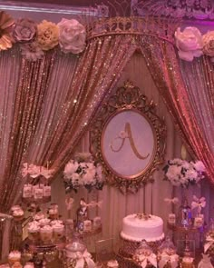 a fancy wedding cake and dessert table with flowers on the side, decorated with gold sequins