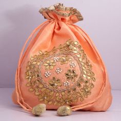 wedding bridal bridesmaids 20s great art deco evening bag | artisan bag hand embroider | indian embroidery potli bag | gota patti potli Material:Silk, Golden Metallic Wire Work, Motifs Color: White Package Contents: 1 Designed with the heart, this beautiful Potli or batawa bag are eye catchy and made of premium material. Key Features: Embroidery art work(gota patti work) This potli is good match with both Indian and western outfits and are superb for wedding and festive parties. This would be be Bohemian Embroidered Fabric With Mirror Work For Wedding, Bollywood Style Party Pouch With Zari Work, Gold Potli Bag With Mirror Work For Gift, Bollywood Party Pouch With Zari Work, Festival Dori Work Potli Bag For Party, Bollywood Style Handwork Potli Bag For Party, Festive Mirror Work Pouch Potli Bag, Traditional Potli Bag With Dori Work For Festive Occasions, Festive Mirror Work Potli Pouch Bag