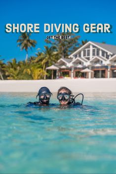 two people wearing scuba gear in the water near a house with text that reads, shore diving gear get the best