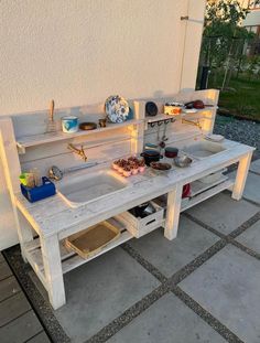 an outdoor kitchen made out of pallet wood