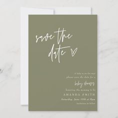 save the date card with white ink on grey paper, featuring handwritten calligraphy