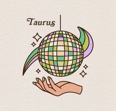 a hand holding a ball with the word taurus on it and stars around it