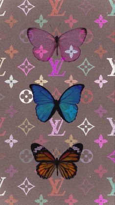 three butterflies sitting on top of different types of louis vuitton wallpapers