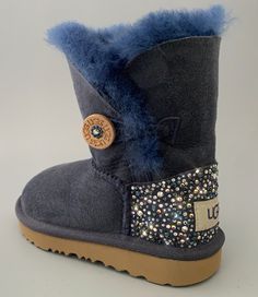 Brand: UGG Australia Condition: New with Box - Buyer will receive boots displayed in listing pictures. Model: UGG BAILEY BUTTON II boots Embellished with beautiful Swarovski Crystals Style: #1017400T Color: Navy Swarovski Color: Montana- Tanzanite- Transitional Crystal- Hematite- Black Diamond- Silver Shadow- Crystal Clear Material: Water resistant Suede TODDLER Size: US9 T see pictures for measurements All merchandise is guaranteed authentic. See left boot inside tag -size labels have been mark Ugg Fashion, Cute Uggs, Ugg Style Boots, Ugg Bailey Button, Ugg Bailey, Girls Boots, Ugg Australia, Girl Clothes, Toddler Sizes