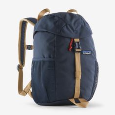 a blue backpack with tan straps on the front and back ends, sitting against a white background