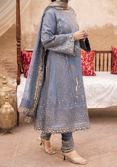 Introducing our New collection 'CHIKANKARI EID '24' by Asim Jofa designed to make you look and feel your best. Envelop yourself in the enchanting hues of bluish grey with this kalidar outfit, a masterpiece from Asim Jofa's "Chikankari" Eid collection. The embroidered details like whispered secrets adorn every inch with grace and elegance. The two-toned mink color zari and gold sequins sparkle adding a celestial aura to the traditional silhouette. With motifs on the dupatta reminiscent of timeless tales, this outfit is a blend of nostalgia and modern allure. Embroidered Center Panel For Back On Paper Cotton. Embroidered Jaal Kali For Front, and Back On Paper Cotton. Embroidered Boti Kali For Front, and Back On Paper Cotton. Embroidered Ghera Border For Front On Paper Cotton. Embroidered Sle Organza Kurti, Batik Print Dress, Dupion Silk Saree, Sajal Aly, Indian Anarkali, Desi Dress, Anarkali Lehenga, Pakistani Designer Clothes, Lehenga Suit