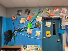 a classroom door decorated with books and magnets