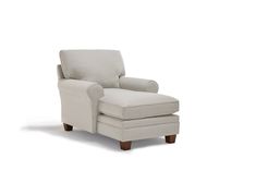 a white chair and footstool on a white background with no one in it