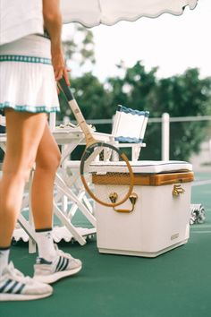 Premium outdoor cooler and tennis-themed setup featuring sophisticated design, ideal for a sporty yet luxurious lifestyle.