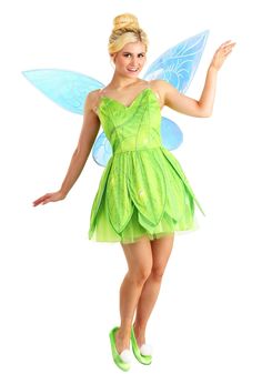 a woman dressed in a green fairy costume