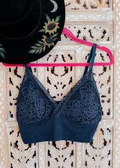 Indulge in the allure of the Daydream Lace Bralette, a sensual yet comfortable undergarment that redefines lingerie elegance. The longline design offers additional coverage and support, while the seamless construction ensures a smooth silhouette under any outfit. Embellished with intricate lace, this bralette is both a style statement and a comfort staple. Ideal for layering under sheer blouses or worn alone for a daring look, it's a versatile piece that transcends occasions. 92% Nylon 8% Spande Seamless Underwire Bra For Loungewear, Fitted Bra With Removable Pads For Loungewear, Elegant Fitted Bra For Loungewear, Blue Seamless Bra For Loungewear, Sheer Blouses, Crazy Color, Dress Layer, Swimwear Sets, Crazy Colour