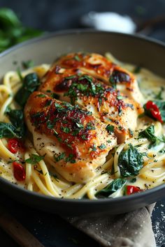 Pasta dish with creamy sauce, topped with grilled chicken, spinach, and red peppers. Fancy Chicken Dishes, Chicken Veggie Recipes, Unique Chicken Recipes, Chicken Florentine Pasta, European Dinner, Chicken Florentine Recipe, Florentine Recipe, Florentines Recipe, Comforting Dinner