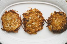 three fried food items on a white plate