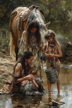 two native american women and a baby in the water with a horse behind them,