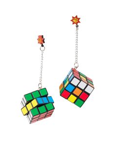 These vintage Rubik's Cube earrings are essential for adding a little bit of nostalgic flair to any outfit! These oversized earrings feature vintage Rubik's Cube toys dangling from a star post back. Not only are these earrings super fun and fabulous, but Rubik's Cubes are fully functional, allowing you to customize the colors to match your look.  The compliments will be endless! These earrings are made in small batches from vintage parts, color variants may occur. Materials:﻿ Metal, Plastic Clas Cube Earrings, Alphabet Jewelry, Oversized Earrings, Rubik's Cube, June Birthstone Jewelry, Zodiac Jewelry, Gifts For New Mums, Pearl Jewellery Earrings, Spiritual Jewelry