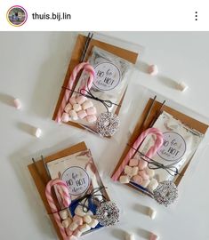 three bags filled with candy and marshmallows