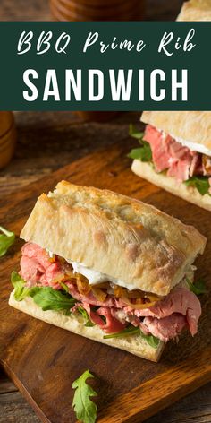 a sandwich with meat and lettuce is on a cutting board next to another sandwich